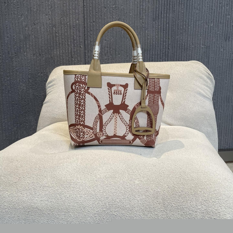 H**mes shopping bags
